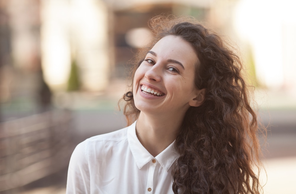 Premium cosmetic dentistry park city, Girl smiling getting cosmetic dentistry work done in Park City, UT